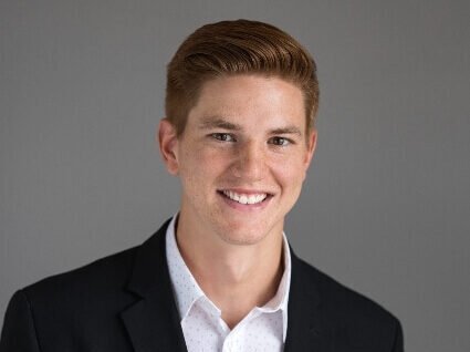 Dr. Brennan Gibbs at Care Chiropractic in Marion IA 52302.